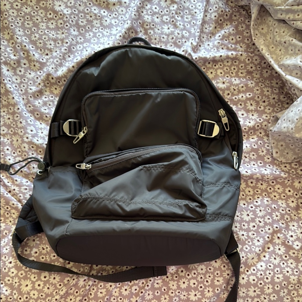 Gymshark Black Backpack with Structured Design and Silver Hardware